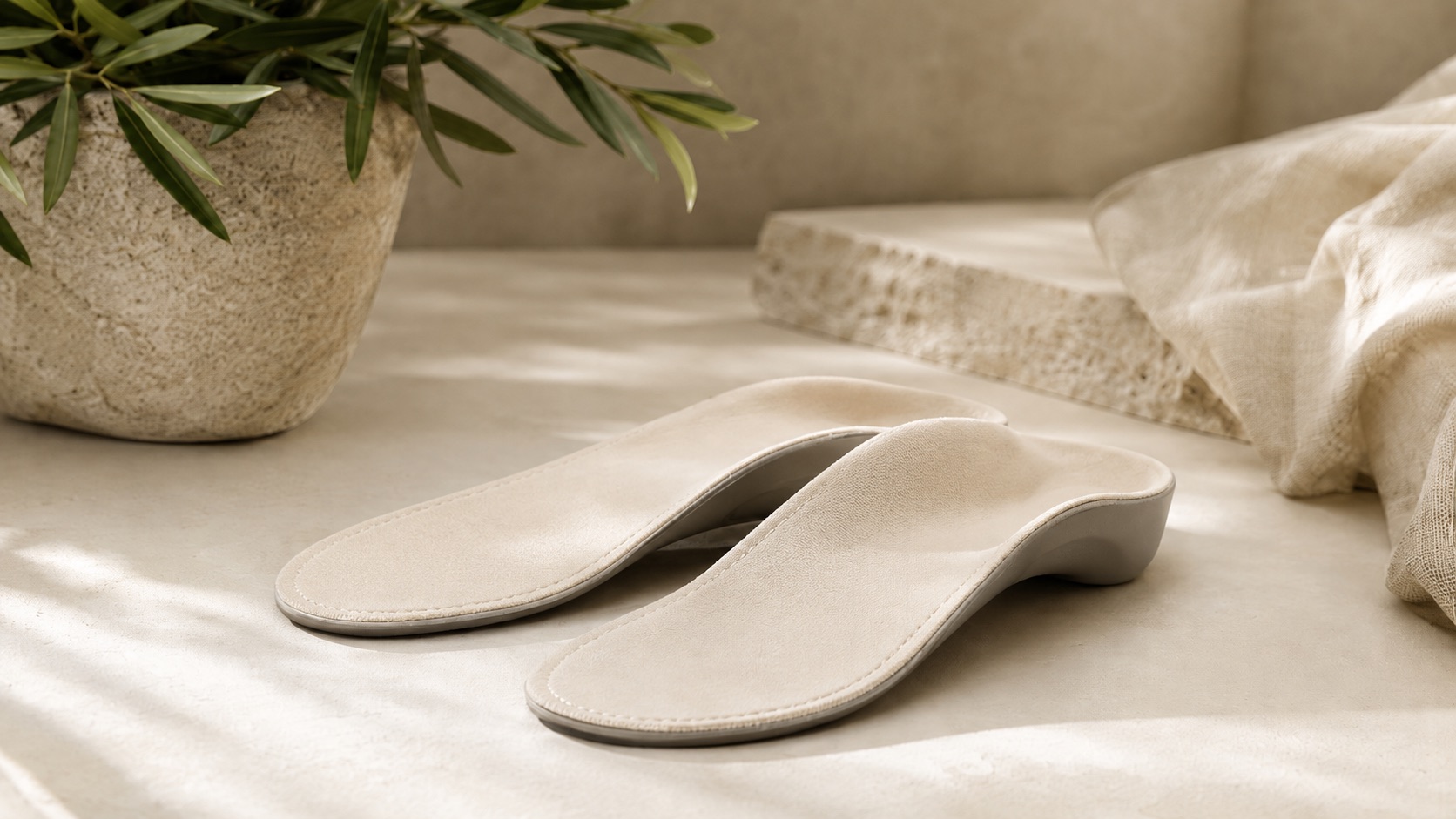 A newly manufactured pair of custom orthotics